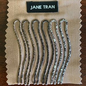 Jane Tran Wavy Metal Hair Clips. Neutral colors